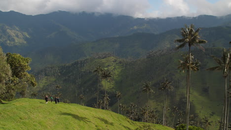 tourists walking along lookout at cocora valley slow motion