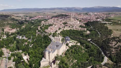 striking aerial shot of medieval castle of alcazar de segovia in spain