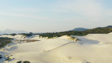 sand dunes and lagoa da conceicao lake at praia da joaquina, florianopolis city, santa catarina, brazil