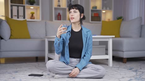 young woman drinking water for healthy life.