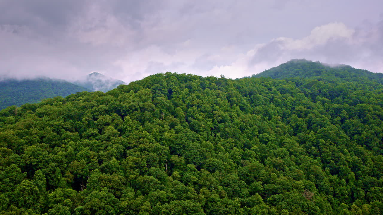 Layers of mountains fade in this cinematic drone shot.