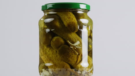 pickled cucumbers in a glass jar