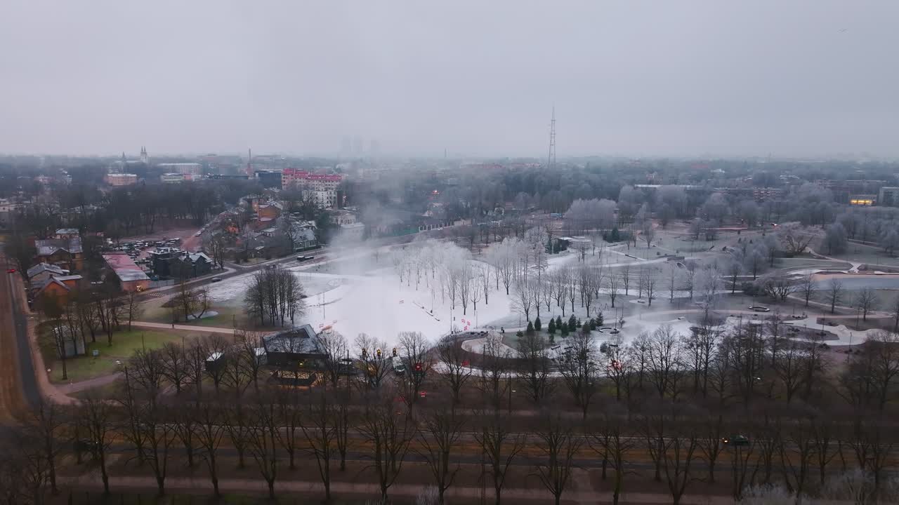 Artificial snow in action, Victory Park Riga, foggy winter - 02.10.2025