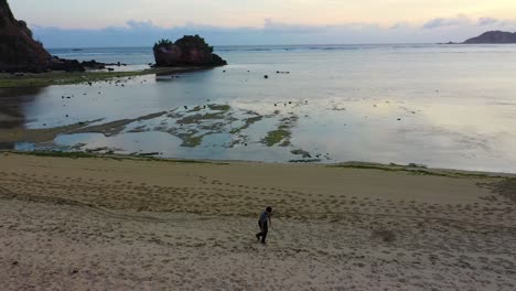 aerial tropical resort on kuta sand beach, lombok, indonesia