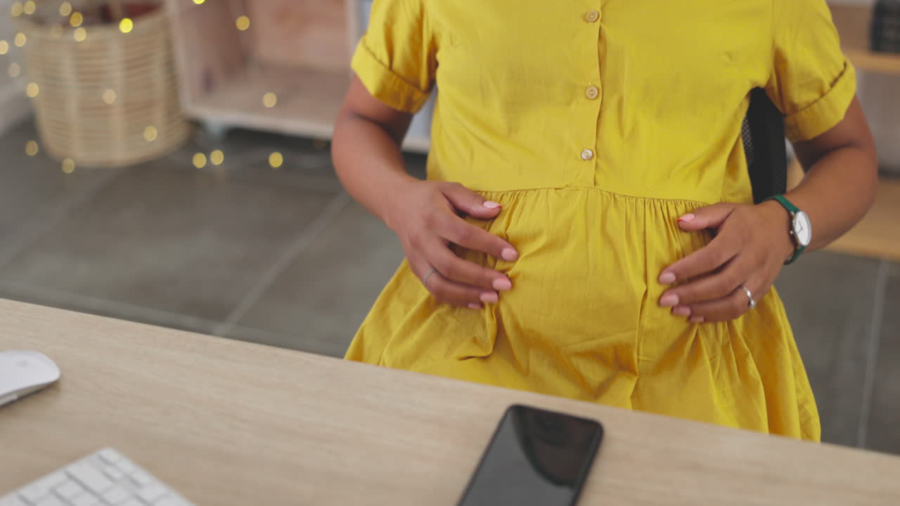 Massage belly, sitting and a pregnant woman