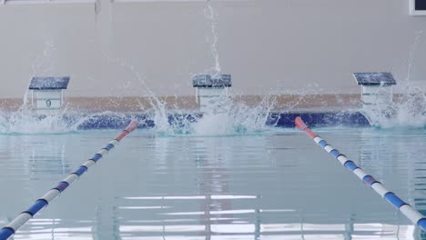 Swimmers-diving-into-the-pool