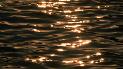 the sea's surface glittered with sparks