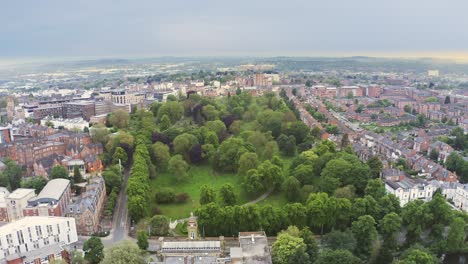 aerial shot flying over a residential community park in nottingham city, england