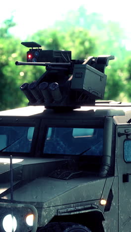 close-up of a military armored vehicle with mounted weapons