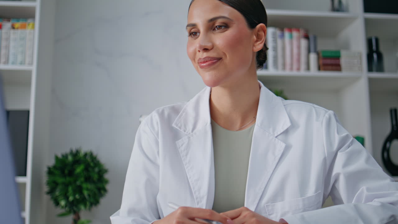 Therapist talking web chat providing consultation in healthcare clinic closeup