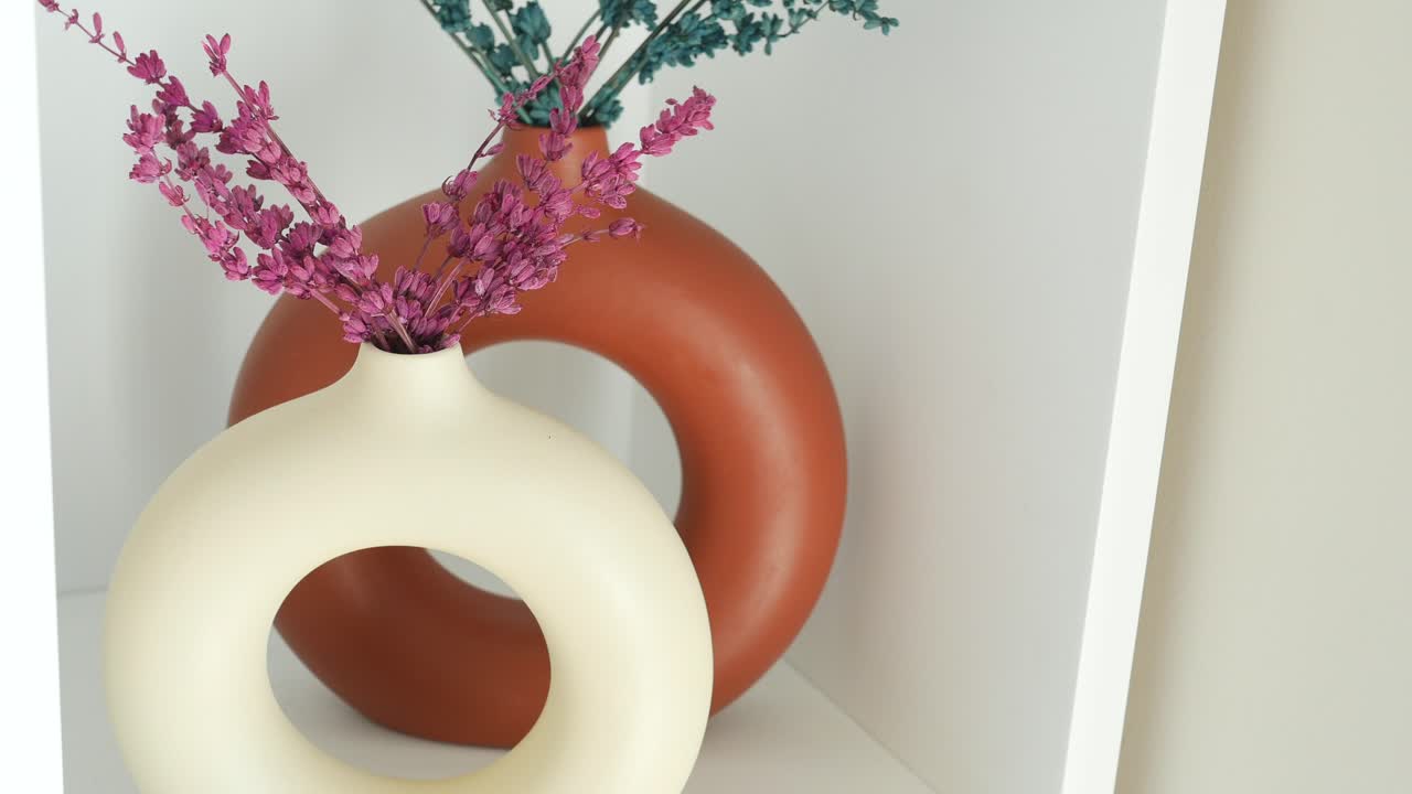 Modern Vases with Dried Flowers on a Shelf
