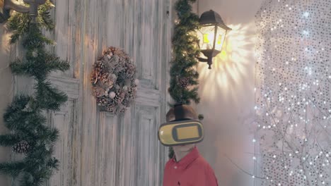 child-in-red-shirt-adjusts-VR-glasses-and-knocks-on-door