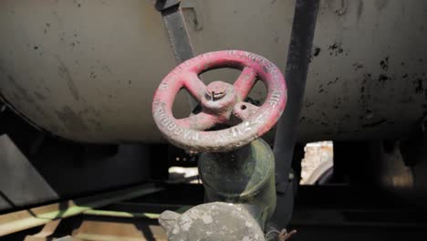 close-up of a vintage train tanker valve