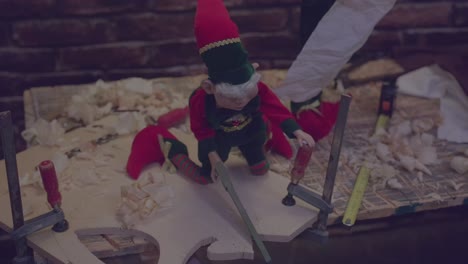 christmas elf woodworking in workshop