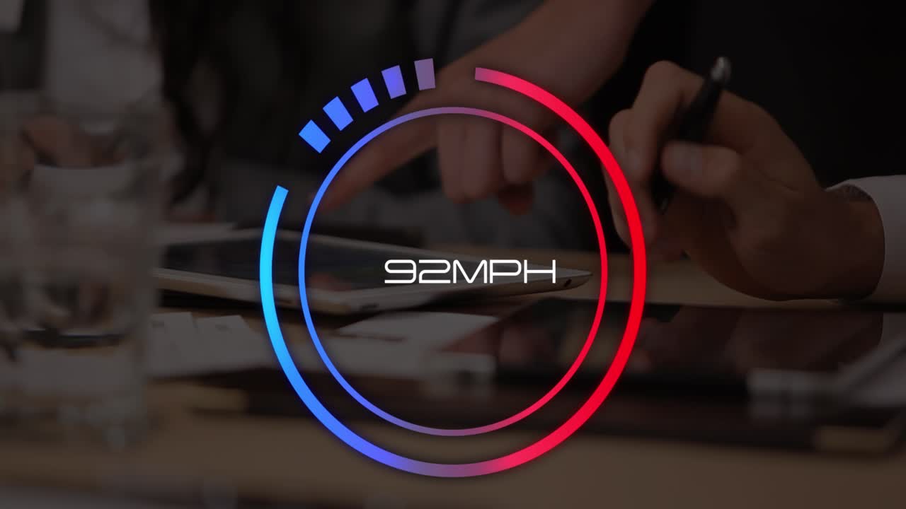 Animation of speedometer over hands of man using tablet