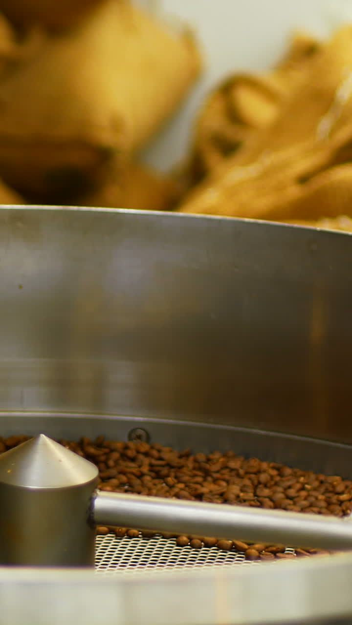Man using coffee grinding machine