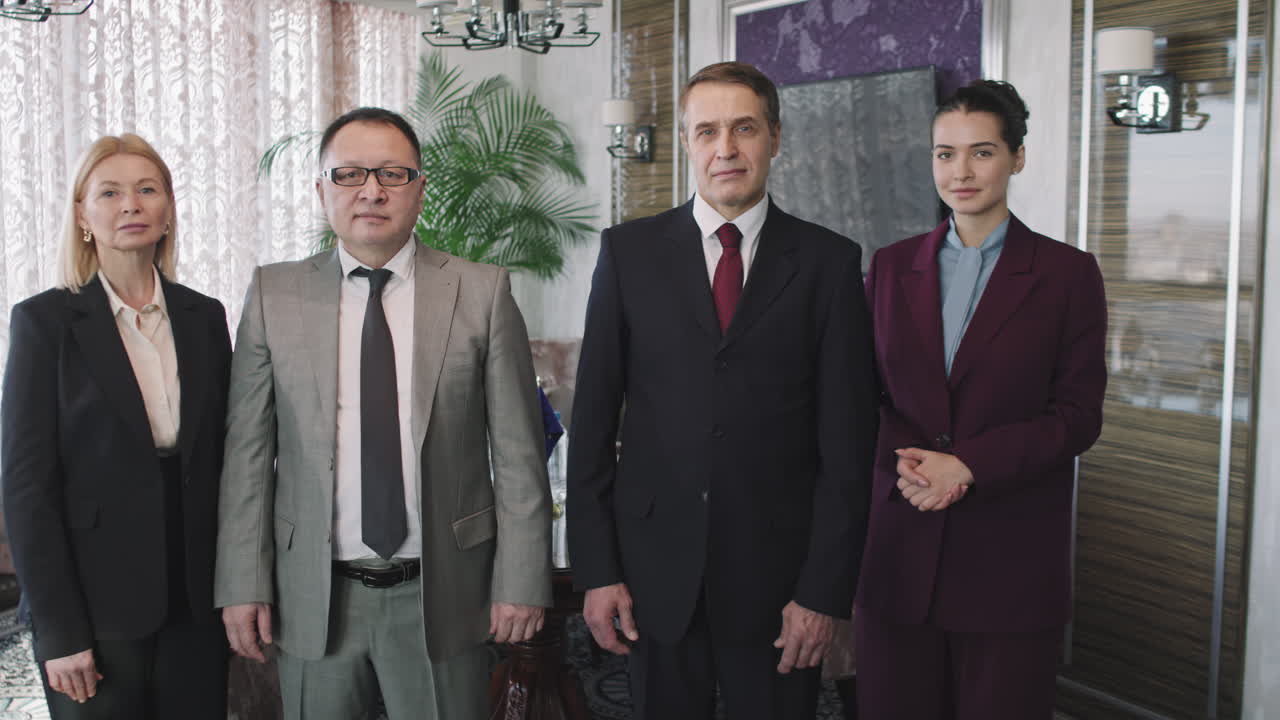 Two Foreign Affairs Ministers With Assistants At Conference Room