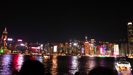 colorful lights reflecting on hong kong's victoria harbour