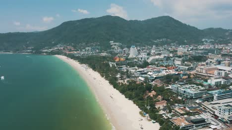 drone footage of patong beach and patong town in phuket thailand