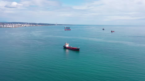 flying towards a fleet of oil tankers mediterranean shore france sunny day