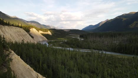 Bird-view-of-Mineral-Lick-area-and-Trout-river-flowing-through-the-valley-of-Northern-Rockies-in-Canada