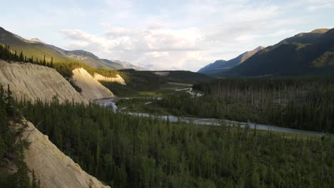 bird view of mineral lick area and trout river flowing through the valley of northern rockies in canada