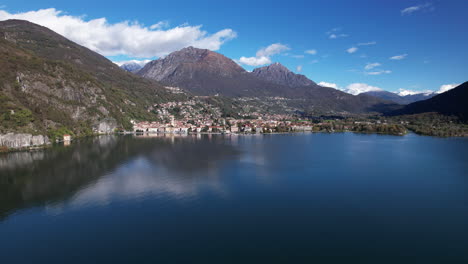 a majestic aerial view of como lake surrounded by magnificent italian mountains