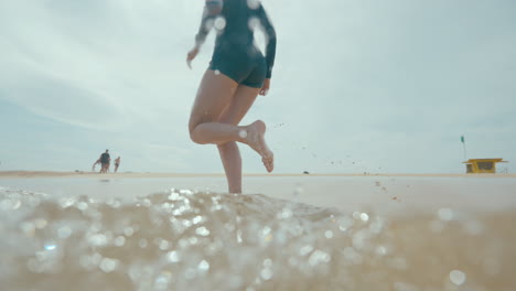 woman running on the beach
