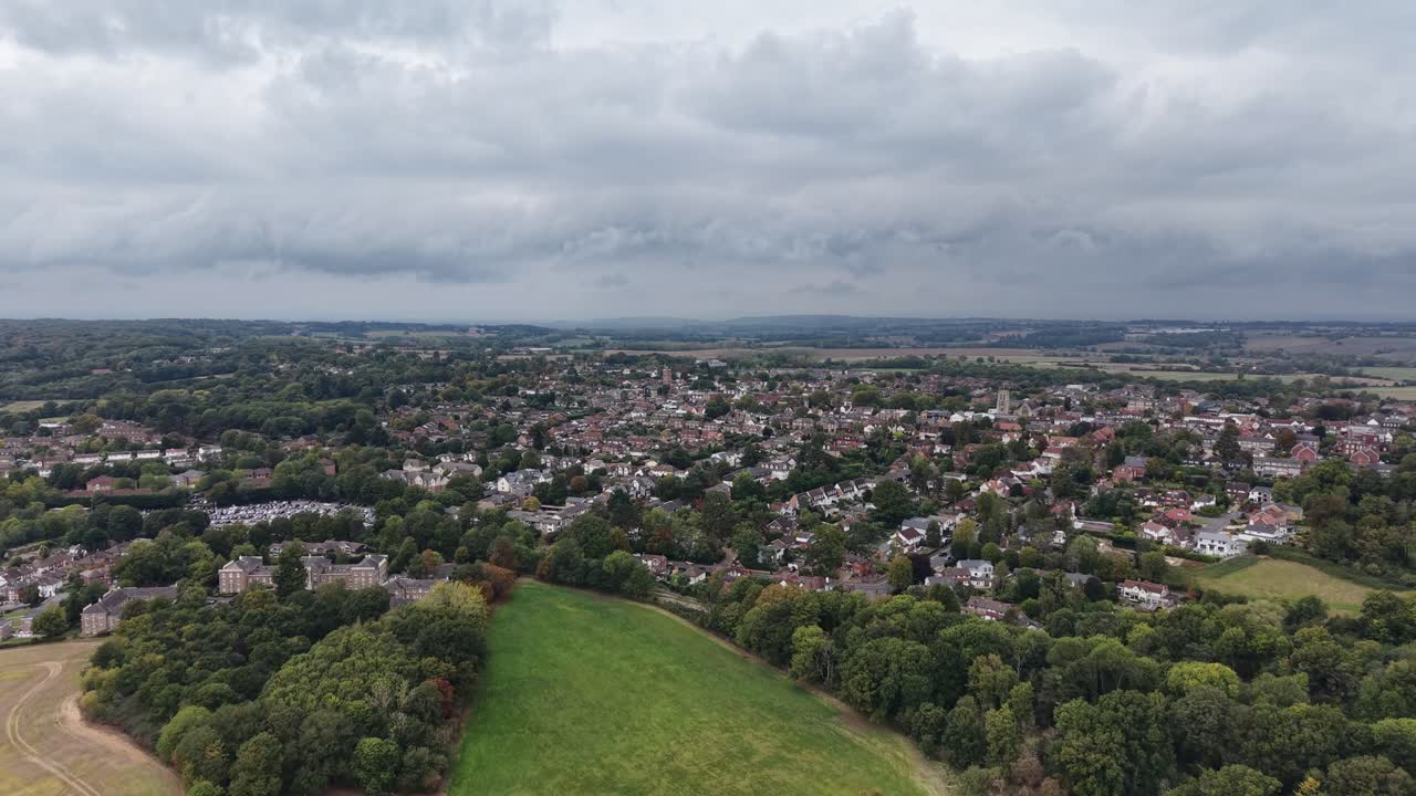 Pull back drone aerial reverse reveal Epping Town centre Essex UK