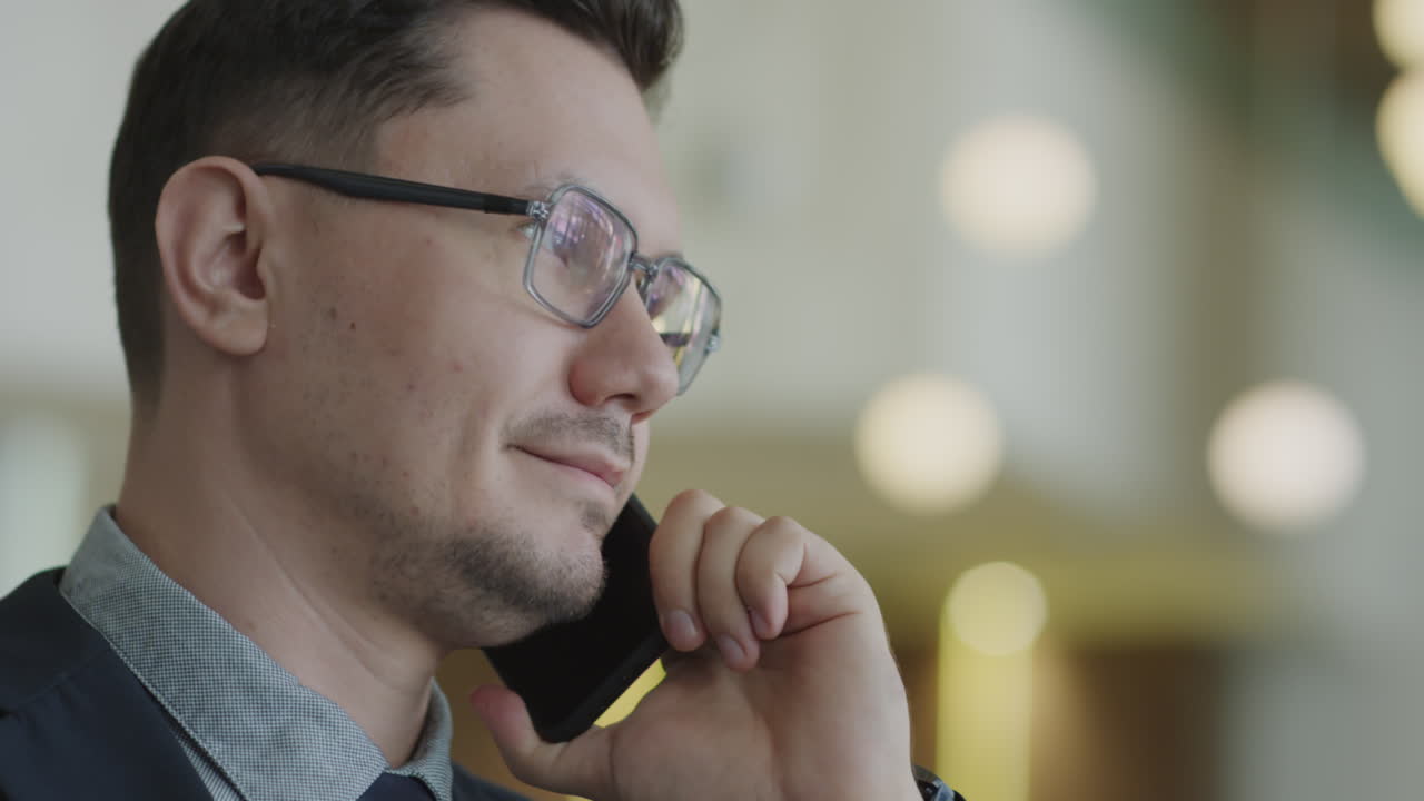 Businessman Speaking on Cell Phone