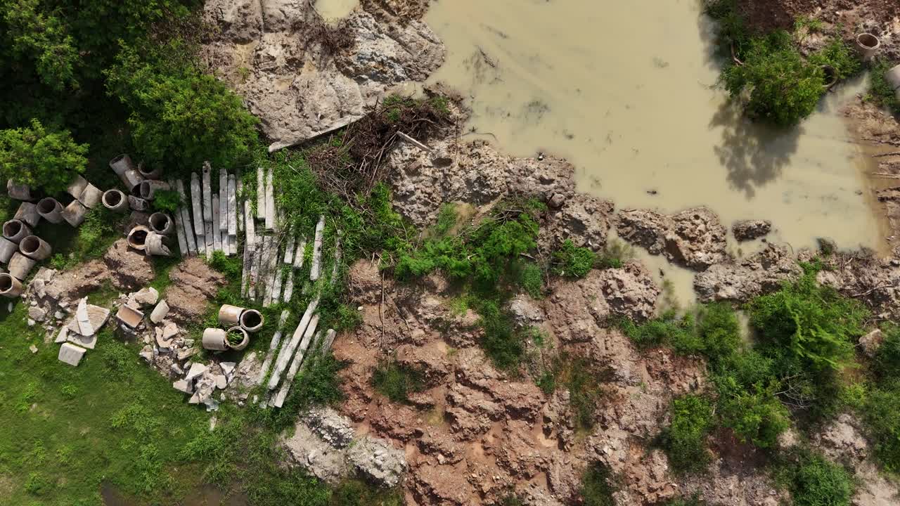 Construction Site with Debris and Water Runoff