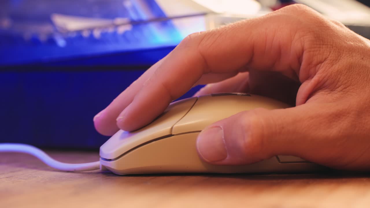 Man working and gaming on retro computer PC, IT engineer with vintage computer at home, using old fashion technology, close up of retro setup.