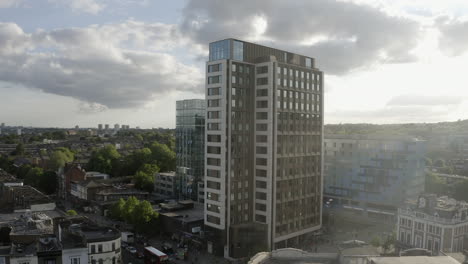 Sun-beams-flare-on-apartment-building-in-Archway-part-of-London,-UK