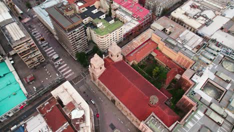 drone establishing shot of the santo domingo church, a dominican temple in downtown santiago, chile