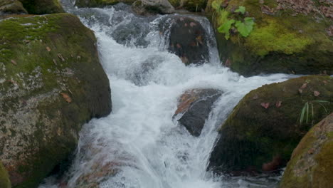 River-water-flow-close-up-at-slow-motion