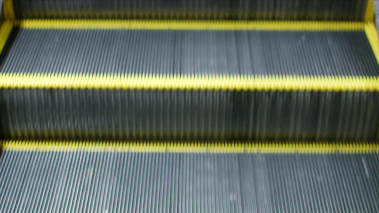 4k video POV of the escalator without any people in airport department store in covid19 crisis