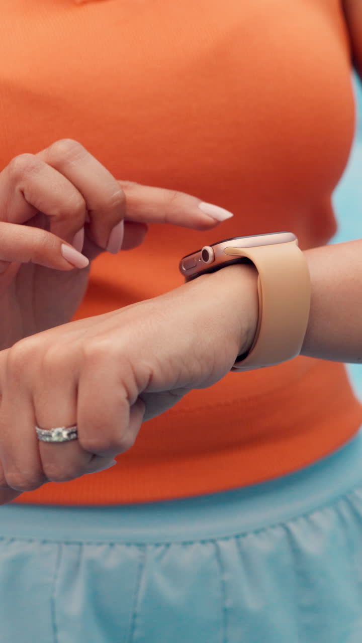 Close-up of Hand Tapping on Smartwatch Screen