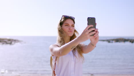 Woman,-beach-and-selfie-with-phone-for-travel