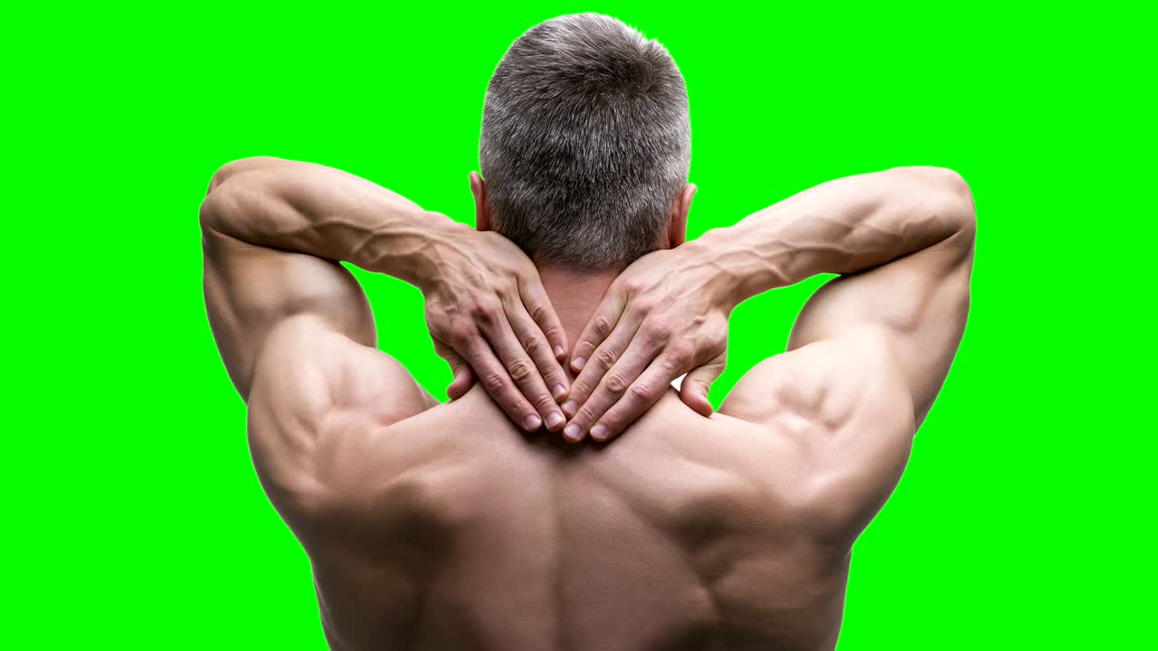 Pain in the neck, elderly muscular man with backache on green background, chroma key 4K video