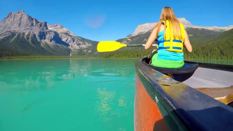 Woman-rowing-a-boat-on-river-4k