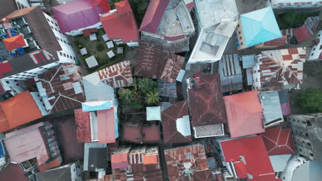 Top-shot-Aerial-view-of-Stone-Town,-old-part-of-Zanzibar-City-4K-Drone