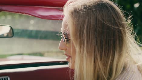 close up video of happy woman going by car.