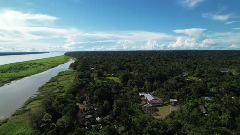 Aerial-shot-of-village-near-the-banks-of-the-Amazon-river-in-Colombia