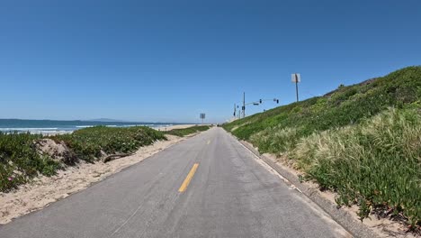 huntington beach california bike trail with views of the beach and pacific ocean.