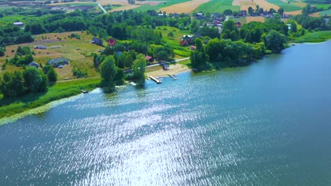 epic top down aerial view of big lake with clear blue water