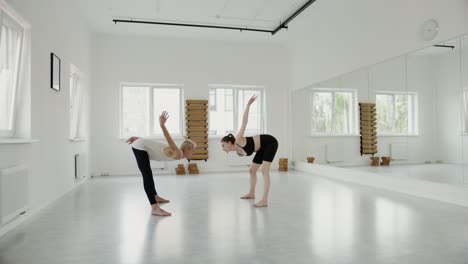 two dancers in a dance studio