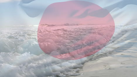 composición digital de la bandera de japón ondeando contra la vista aérea de las olas en el mar