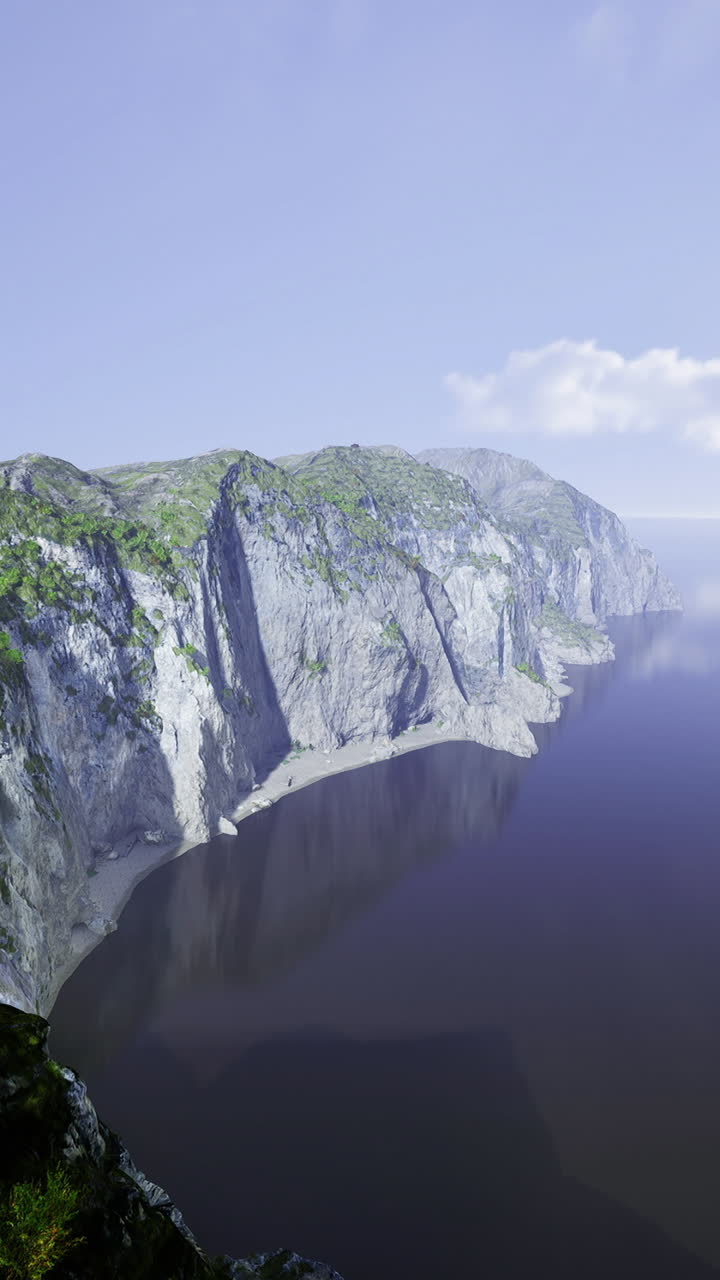 Stunning coastal cliffs at sunrise reflecting in calm water below