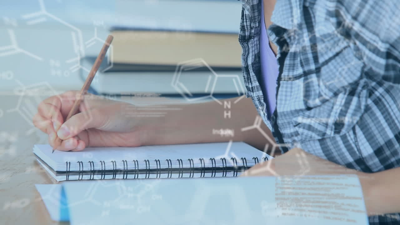 학생 이 메모 를 쓰고 있는 모습