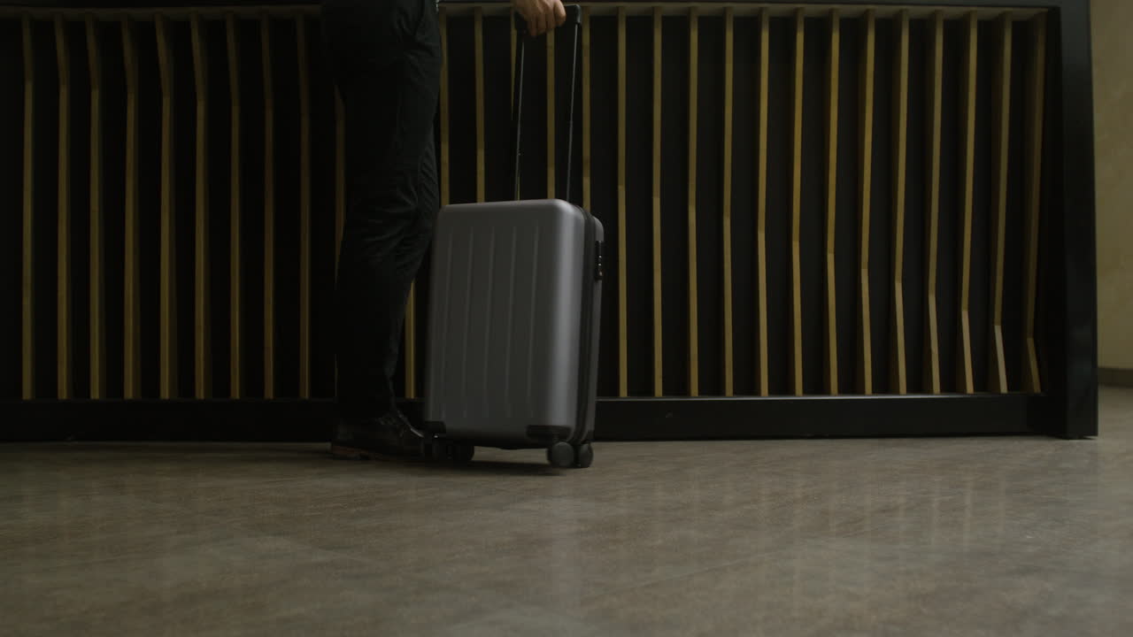 Man legs walking in a hotel